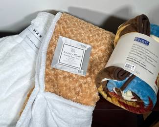 (3pc) NWT BLANKETS | Including: Max Studio Home Faux throw blanket, Olivia Gray reversible Sherpa throw, and Aztec designed throw blanket.
