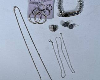 STERLING SILVER JEWELRY | Including: engraved "Mark" bracelet marked "925" on band and chain clasp (41.8g), pair of heart earrings marked "925 THAILAND" (3.8g), rope chain marked "Italy 925" (5g), heart pendant with diamond simulants marked "A925 Thailand" (3.2g), set of 3 pair of graduating hoop earrings marked "THAI 925 FAS" (2.4g), and broken silver chain marked "925" (1.8g); Total weight: 58g. - l. 18 in (Rope chain)
