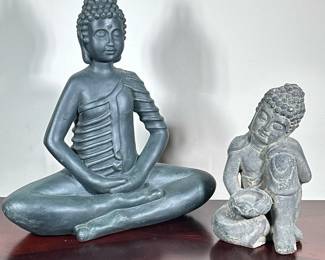 (2pc) PAIR BUDDHA STATUES | Pair of ceramic Buddha statues, one with tea candle holder, one in prayer/mediation pose. - h. 19 x w. 16.5 x d. 6 in