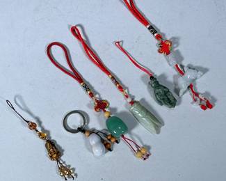(6pc) CARVED JADE & OTHER CHARMS | Including: carved jade cricket charm, carved jade hand charm, carved dragon charm (head broken), carved buddha charm, and more! - l. 9 in (largest)