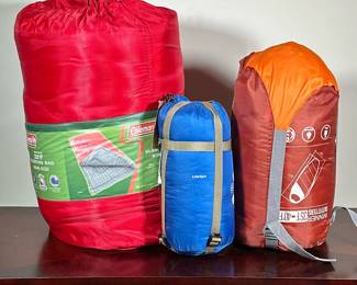 (3pc) SLEEPING BAGS | Including: Coleman 20 degree King Size Sleeping bag, Winner Outfitters 35 degree sleeping bag, and NWT LIXADA LW180 light sleeping bag.