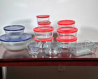 (14pc) PYREX GLASS DISHES | Large lot of Pyrex glass dishes including bowls, rectangular dishes, circular dishes and measuring cup. - h. 4.5 x dia. 11.25 in (largest)