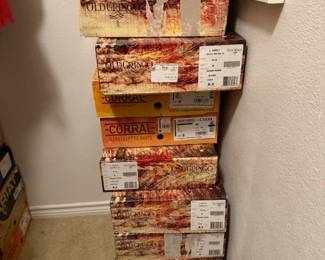 Boxes of boots never worn sizes 8-8.5