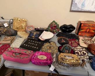 Purses, many styles, themed, many designers, one of a kind and named brands