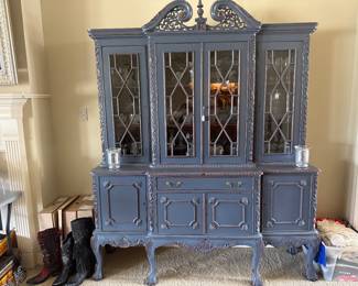 One of a kind Blue hutch filled with glassware