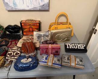 Purses, many styles, themed, many designers, one of a kind and named brands