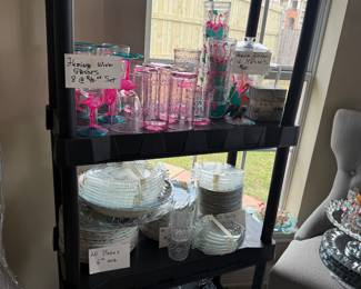 Pink Flamingo plastic dishes, glasses and star fish bowls ready for your patio party