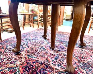 Lot (21) Clawfoot Oak Dining Table with 3 Leaves. As shown 45”d 28”h, 3 leaves 12” each, max 72”L 45”W.    Lot (60) Karastan Wool Area Rug Kirman Pattern 717 6’6” x 9’