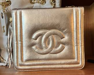 Vintage CHANEL CC stitch flap bag with tassel gold leather