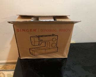 Several sewing machines new in boxes 