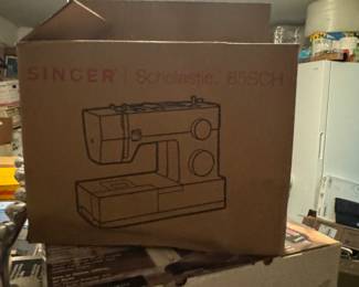 Singer sewing machine in box new