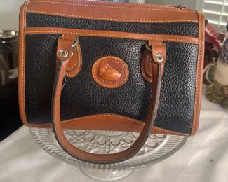 Dooney & Bourke Black peppled leather handbag with brown leather trim $40 like new