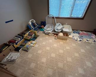 books, baby rockers, handmade baby clothes