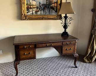 Gorgeous desk with Queen Ann legs.  Rich and so sophisticated.  Look at the rope edge detail.