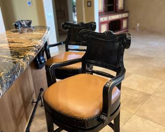 Swivel barstools that were hardly ever used.