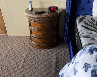 Note the burl wood used on the drawers.