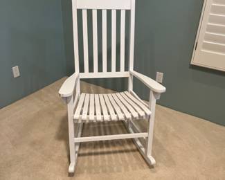 Sweet rocking chair in a white wash.