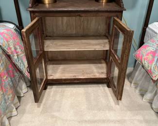 A unique table perfect to house your collections.