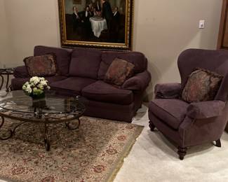 The cocktail and end tables are everything with a heavy beveled glass and dark iron base.