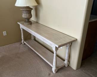 White washed entry table that can also work as a sofa table.