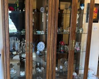 2 large curio cabinets