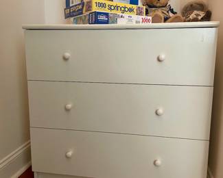 White 3 drawer dresser, puzzles, stuffies....