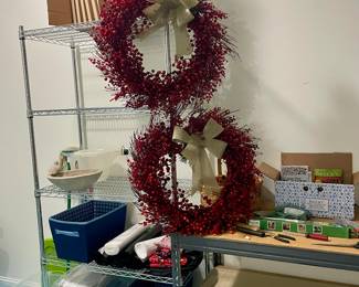 Tall metal shelf, berry wreaths, storage containers, bins, metal long shelf...