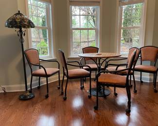 Metal base, wood top round table, 6 rolling chairs & tiffany style floor lamp