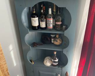 Cool blue corner shelf.