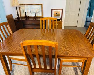 This is a poker table.  Since we all eat out, there is no sense calling it a dinner table.