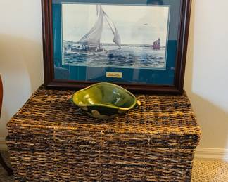 Wicker chest.  Not quite big enough for a body.  You can put those folded things with blue tape in it.