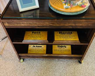 Again, I'm the one typing.  Name sign stand.  Maybe game table since it seems to do ok holding the game on top.