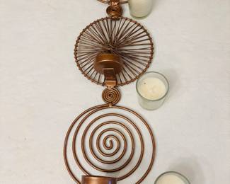 Candle holder with candles.  Some assembly required.  That means put the candle in the holder.