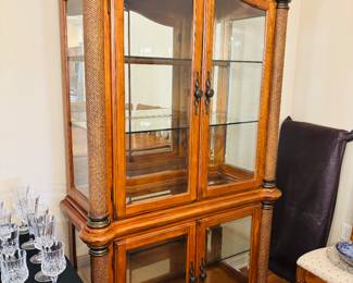 Curio cabinet without curios.  That part is up to you, be a team player.