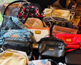 Purses, purses, and more purses.  She won't keep anything in it, but it will match her outfit.