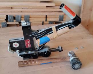 Floor nailer and hammer.