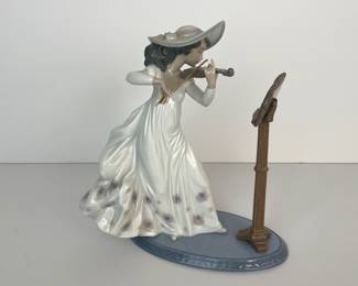 Lot 69 Lladro Sweet Symphony Porcelain Figurine
