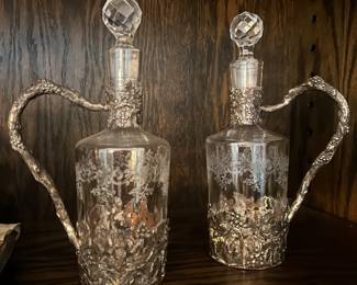 Pair of glass decanters with silver mounts