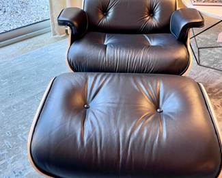 Iconic Eames Lounge Chair and Ottoman in Walnut with stamped Medallion and COA..