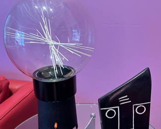 Gorgeous Mid Century Modern Black Stone Etched Mask Face, 9.5" H x 6.5"W, Shown with a Modern Iron Pedestal Globe Table Lamp. 