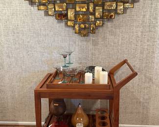 1970's Mid Century Modern Mario Jason Signed Brass Wall Sculpture, 52"W x 33"H, Shown with a Crate and Barrel Regatta Bar Cart 32" x 38" x 30".