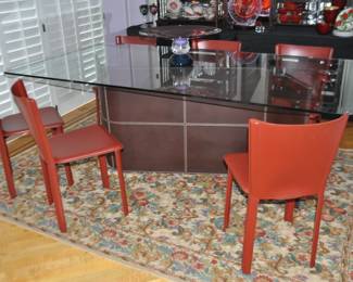 Top View of the Roche Bobois Italian Brown Leather Serpentine Dining Table Shown with a Set of 6 Design Within Reach Frag Red Leather Dining Chairs. (CHAIRS SOLD)