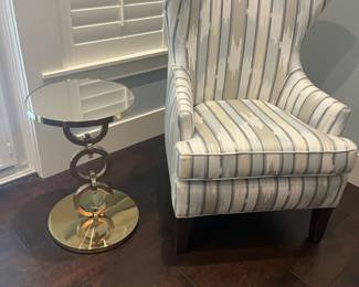 Pair of wing back chairs, chrome side tables. 