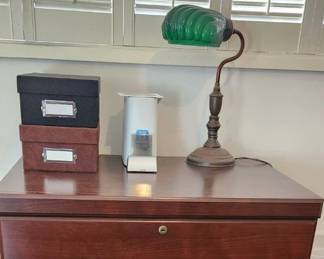 lateral file cabinet. vintage brass lamp green shade