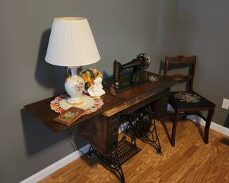 Singer Sewing Machine in Cabinet Excellent Condition, Needlepoint chair, Lamp, Thimbles, Doilies