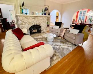 Gathering Room: White Sofa (NFS) 
6' Square shag Rug, Carrera Marble top table, (2) Larry Lasko Leather chairs 