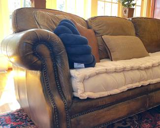 Robinson & Robinson Hand Finished Saddle leather Sofa customized with a Creme Velvet tufted box cushion. 
7' long • 36" deep • 31" tall
