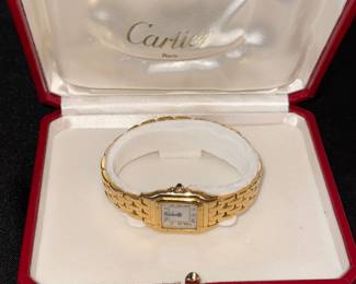 18K gold, Cartier Panthere ladies watch. Keeps perfect time. The real deal.