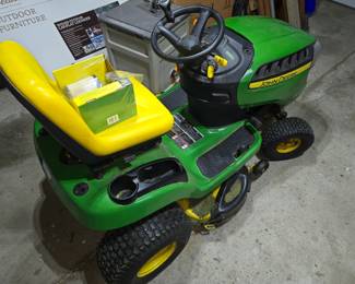 John Deer Rider Lawn Mower
42" D 110