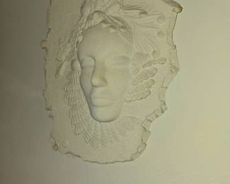 Sculpture cast of woman face